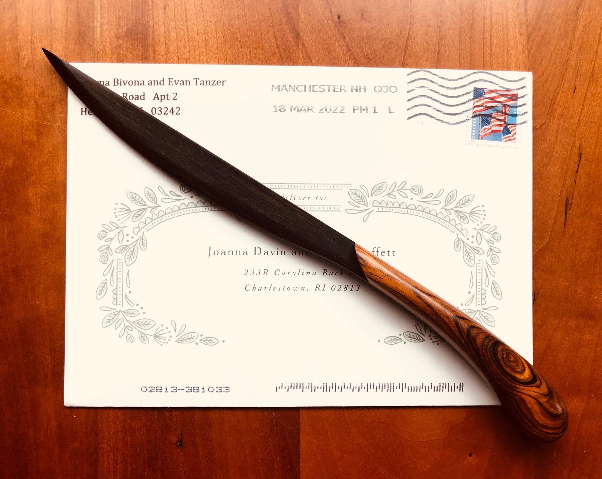 letter opener with ebony blade on envelope