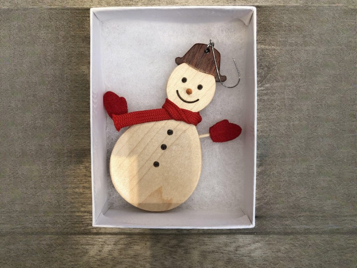 Christmas ornament snowman in gift box