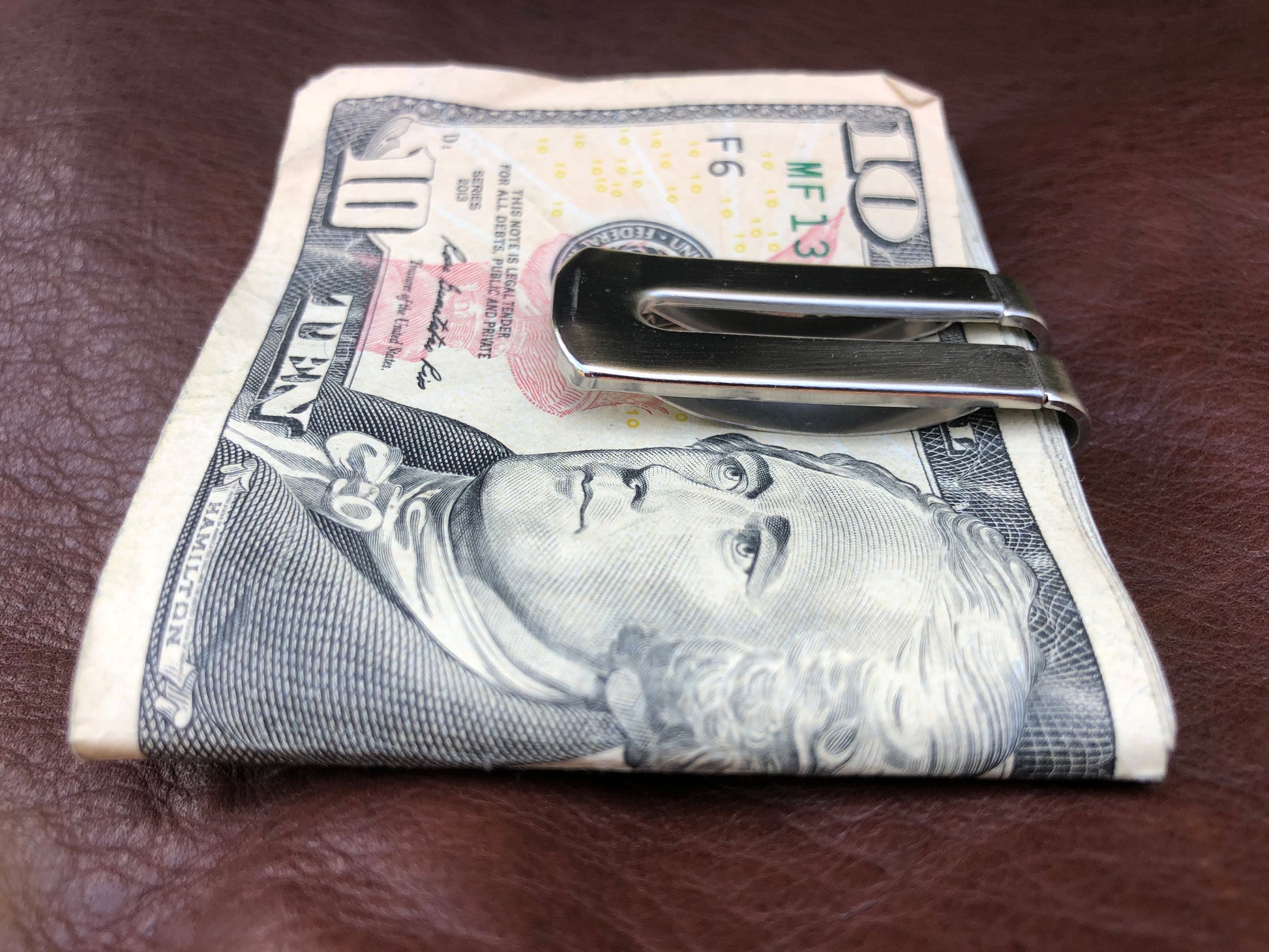 money clip holding money
