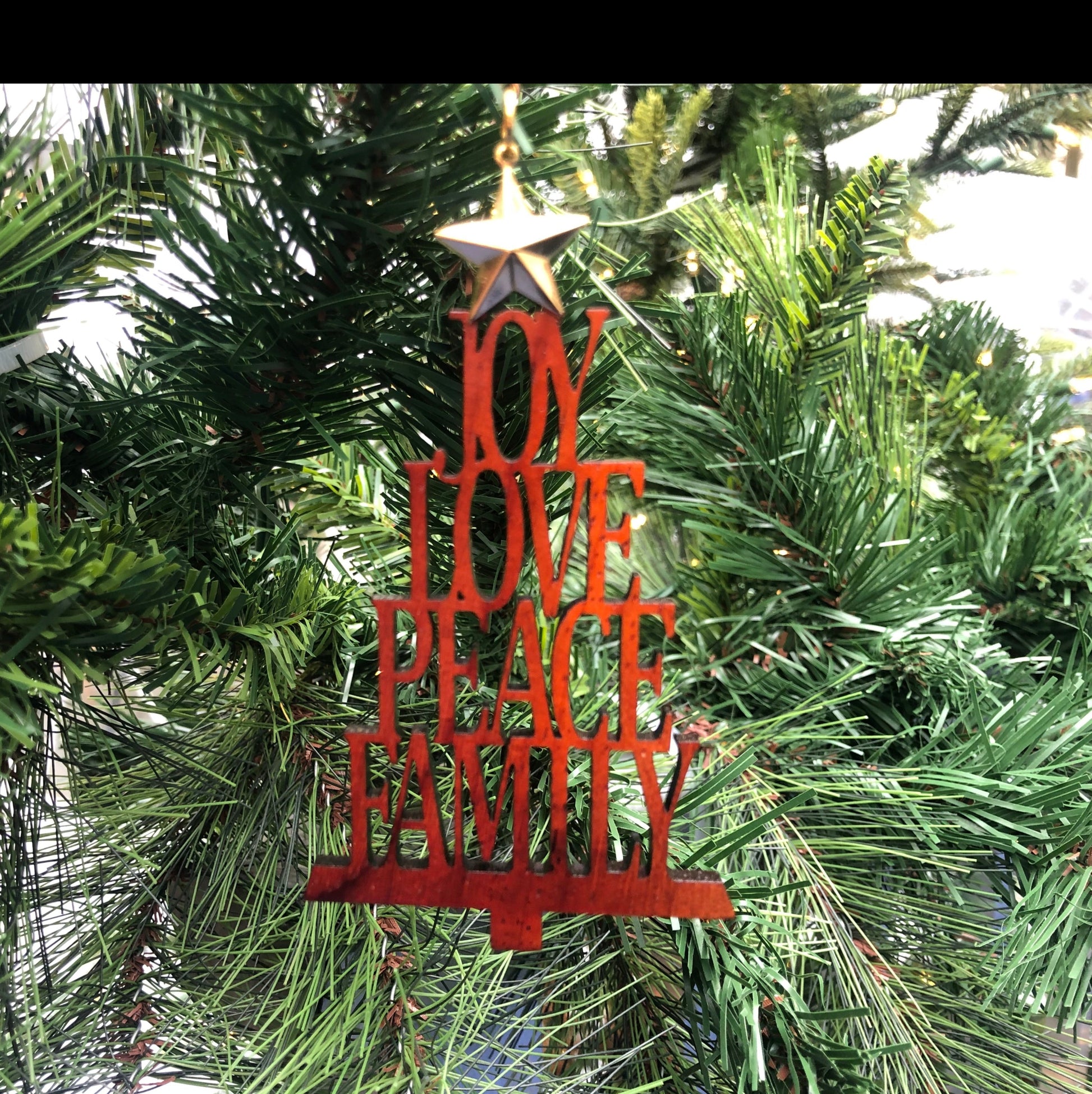 Christmas ornament on tree padouk